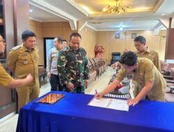 Wujud Sinergitas TNI dan Pemerintah Daerah, Dandim 1310/Bitung Tandatangani Karya Bakti Revitalisasi Marshalling Area Yon TP 916 Makawidey