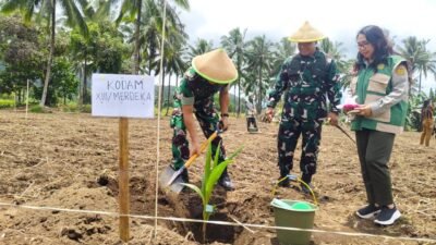 Dukung Program Hilirisasi Perkebunan, Dandim 1310/Bitung Ikut Tanam Kelapa