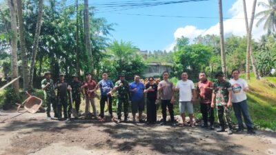 Peduli Keselamatan Pengguna Jalan, TNI, Polri dan Pemerintah Kecamatan Dimembe, Kerja Bakti Gerakan Indonesia Asri Timbun Jalan Berlubang di Ruas Poros Dimembe – Likupang