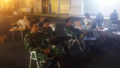 Ciptakan Suasana Akrab, Personel Kodim 1310/Bitung Nonton Bareng Piala Dunia 2026 Bersama Masyarakat