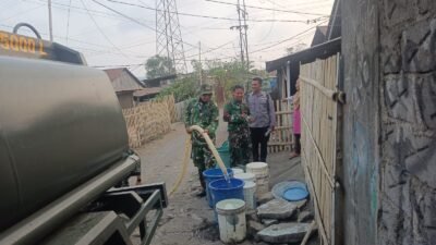 Peduli Kemarau Panjang Akibat El Nino, Kodim 1310/Bitung Gerakkan Bakti TNI, Salurkan Air Bersih “Door To Door” Bantu Warga Terdampak Kekeringan